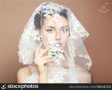 Fashion photo of beautiful women under white veil. Beauty portrait