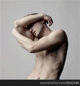 Fashion photo of naked male with strong body