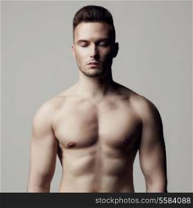 Fashion photo of naked male with strong body