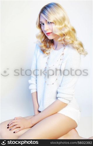 Fashion photo of young magnificent woman. Girl posing. Studio photo. Blonde woman. Perfect Makeup