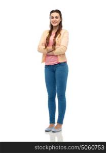 fashion, portrait and people concept - happy smiling young woman in cardigan and jeans. happy smiling young woman in cardigan and jeans
