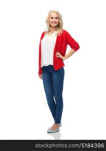 fashion, portrait and people concept - happy smiling young woman in red cardigan and jeans. happy smiling young woman in red cardigan