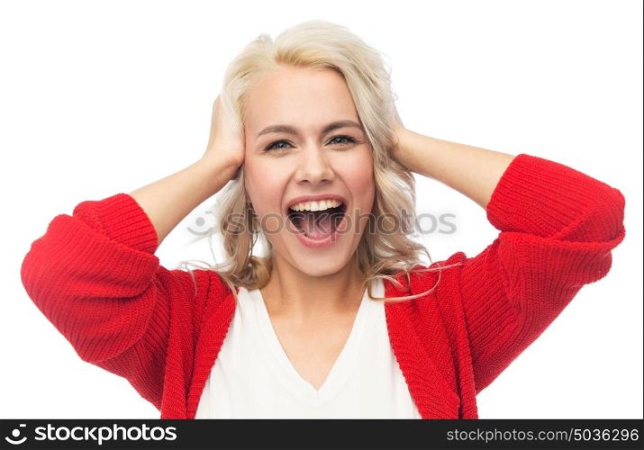 fashion, portrait and people concept - happy young woman in red cardigan holding her head and laughing. happy young woman holding her head and laughing