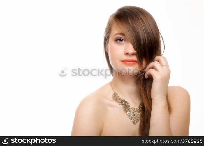 fashion portrait of a woman face with beautiful long natural hair bang covering her eye. Isolated on white.
