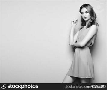 Fashion portrait of beautiful young woman in a summer dress. Beauty spring photo. Black and White photo