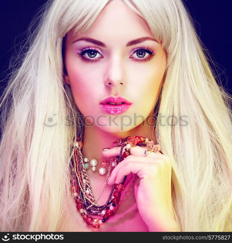 Fashion portrait of elegant woman with magnificent hair. Blonde girl. Jewelry. Perfect make-up