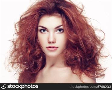Fashion portrait of elegant woman with magnificent hair. Brunette girl. Perfect make-up. Girl on white background. Curly hair
