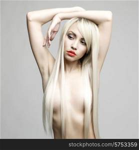 Fashion portrait of sexy blond woman with helthy luxurious hair