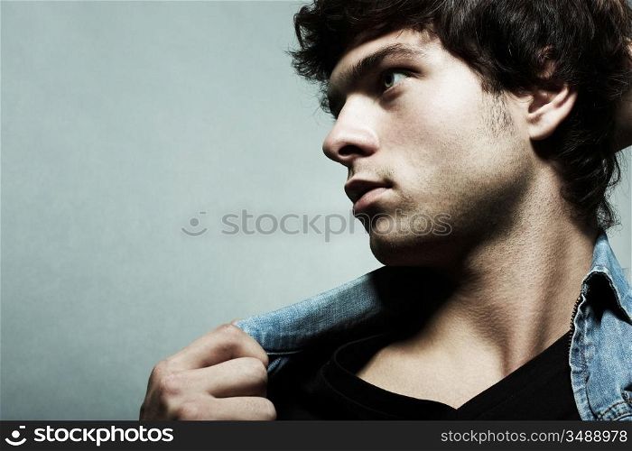 Fashion portrait of the young beautiful man