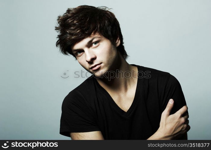 Fashion portrait of the young beautiful man