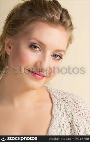 Fashion portrait of young girl on yellow background