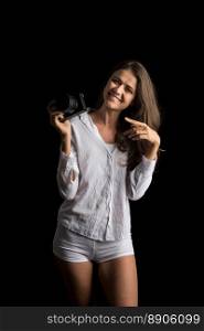 Fashion Portrait of young Woman photographer with camera