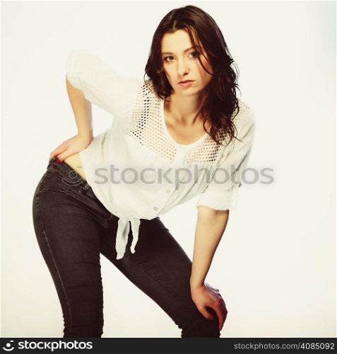 Fashion. Sexy plus size woman in casual clothes, posing studio shot