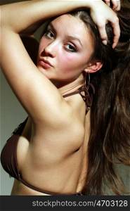Fashion shot of a beautiful, sexy, brunette woman in Brown lingerie &#xA;