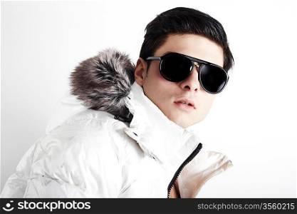 Fashion Shot of a Young Man A trendy European man dressed in contemporary cloth.