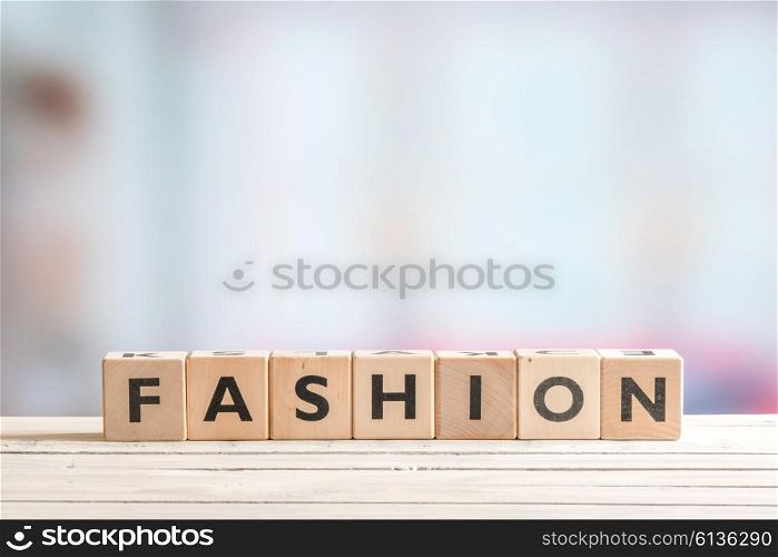 Fashion sign made of wooden blocks on a table