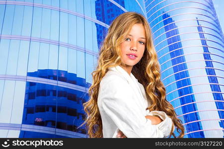 Fashion student girl as businesswoman portrait in urban blue city buildings