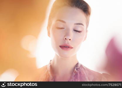 Fashion studio photo of young beautiful lady on white background. Fashion and beauty