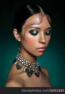 Fashion studio portrait of beautiful asian woman with diamond necklace. Fashion and Beauty. Perfect makeup