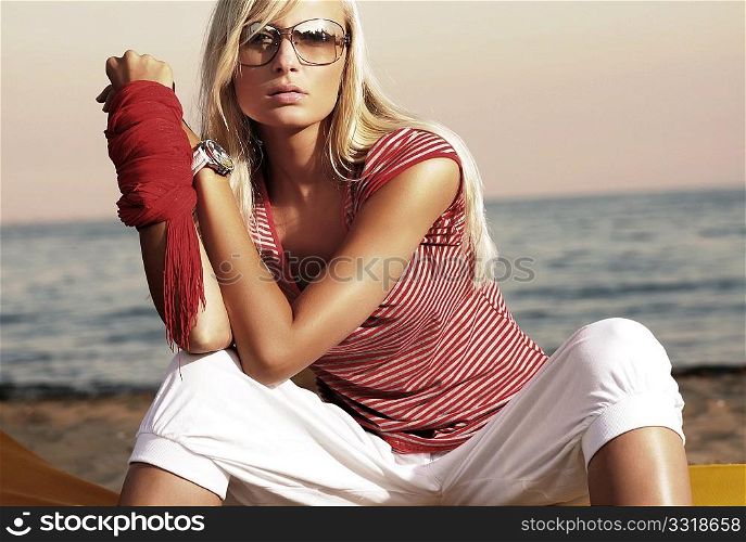 Fashion style photo of an attractive woman in sunglasses