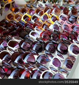 Fashion sunglasses rows in outdoor shop display pattern