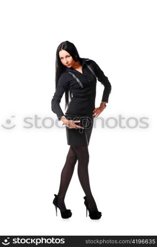 Fashion woman in a black dress isolated over white