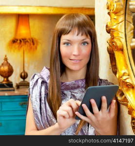 fashion woman reading ebook tablet in vintage grunge house