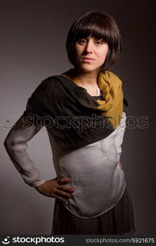 fashion young woman on a grey background