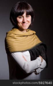 fashion young woman on a grey background