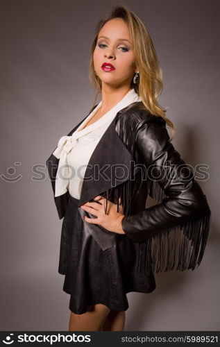 fashion young woman on a grey background