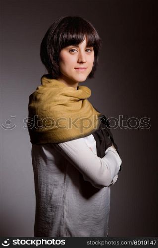 fashion young woman on a grey background