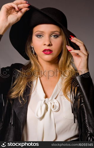 fashion young woman on a grey background