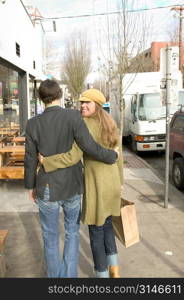 Fashionable Caucasian Girl Out Shopping With Her Boyfriend