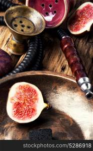 fashionable hookah in figs. Turkish smoking hookah with tobacco flavor of ripe figs in retro style