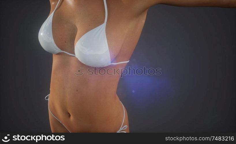 Fashionable young woman in swimsuit posing in studio