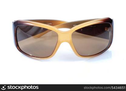 Fasion brown and gold sunglases isolated on white background