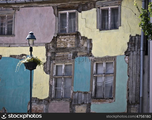 Fassade-bunt. facade of an building listed for demolition in various colors