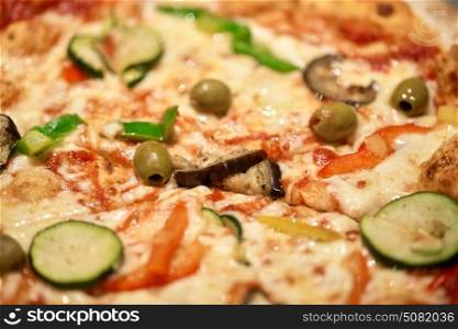 fast food, italian cuisine, cooking and eating concept - close up of pizza. close up of pizza