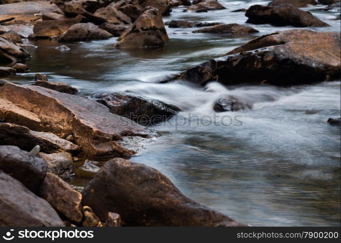 fast mountain river flowing among stones. landscape