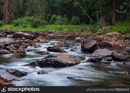 fast mountain river flowing among stones. landscape