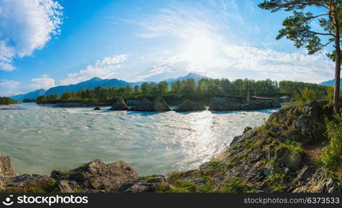 Fast mountain river Katun. Fast mountain river Katun in Altay, Siberia, Russia. A popular tourist place called the Dragon&rsquo;s Teeth