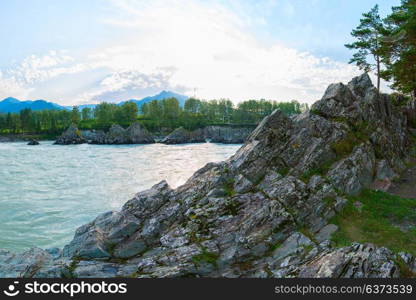 Fast mountain river Katun. Fast mountain river Katun in Altay, Siberia, Russia. A popular tourist place called the Dragon&rsquo;s Teeth