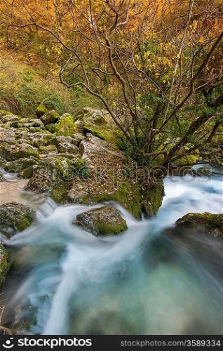 Fast river in Fontaine-de-Vaucluse, France