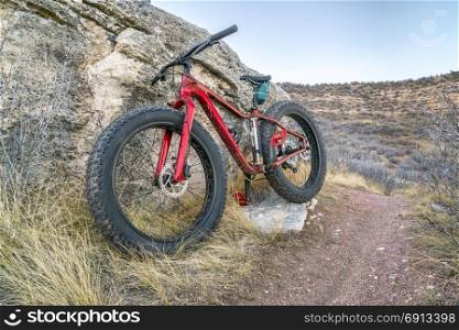 fat bike on a trail in Soapstone Prairiere Natural Area in northern Colorado, late fall scenery