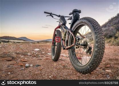 fat bike on desert trail with deep, loose gravel - Big Hole Wash Trail in Red Mountain Open Space north of Fort Collins, Colorado