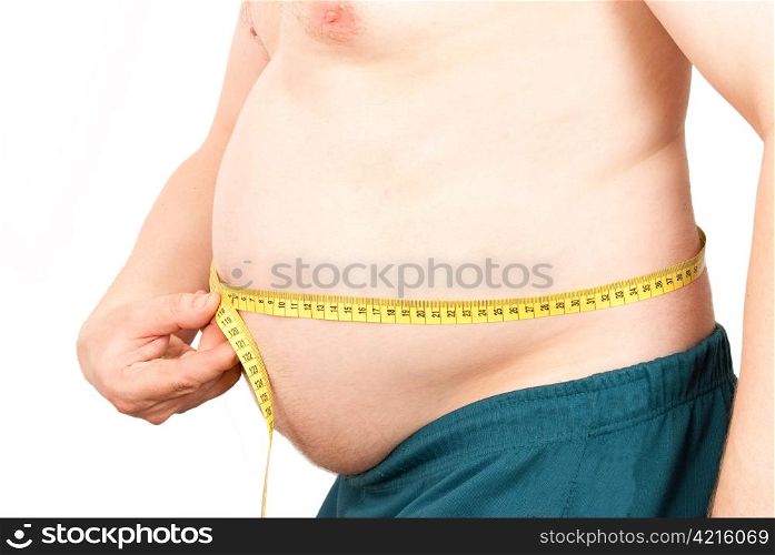 Fat man holding a measurement