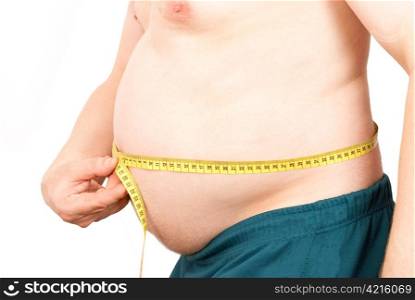 Fat man holding a measurement