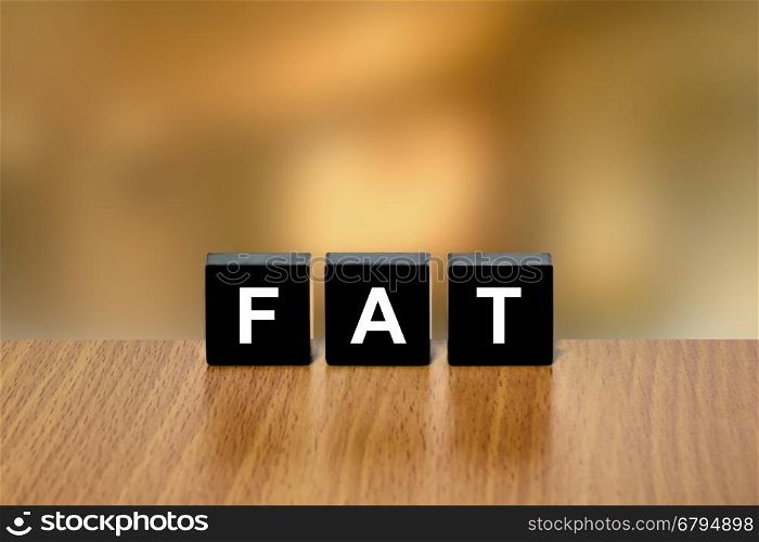 Fat on black block with blurred background