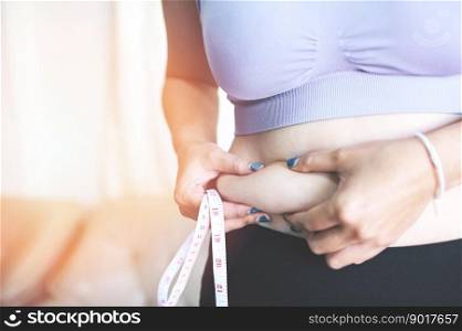 Fat woman measuring , fat woman fat belly chubby paunchy sport recreation health care lose belly fat concept, woman holding excessive belly with measure tape