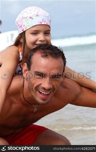 Father and daughter at the beach